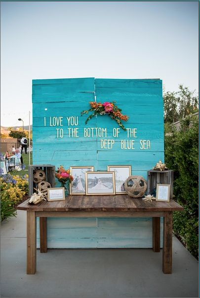 Welcome your guests to your beach wedding with a simple and adorable table.