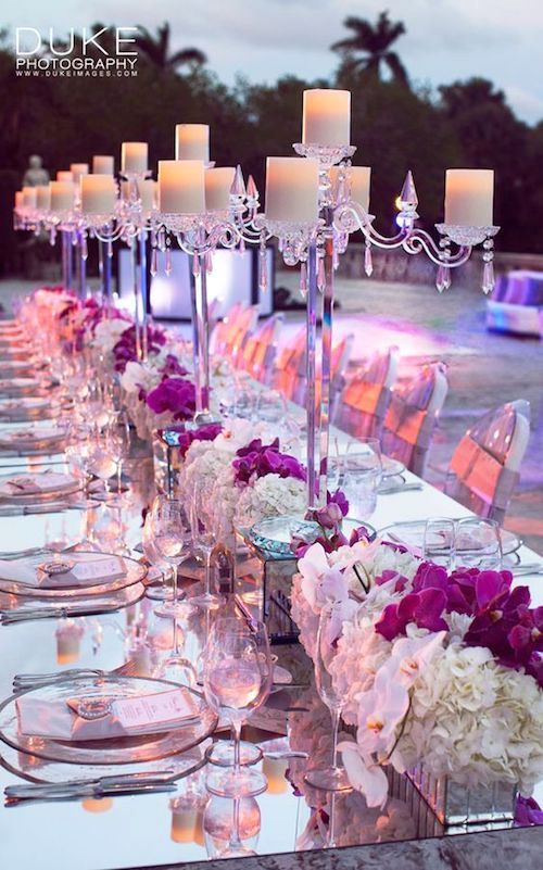 Love this purple table decor with mirrors. Super fancy! Photo: Duke Photography.